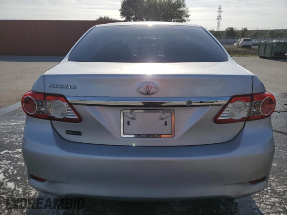 2013 Toyota Corolla L with VIN 2T1BU4EE2DC031710, listed as a Copart auction lot 54219725 with 132,197 mi miles and Salvage Title. Bid and sale history available at carsss.com. Image 6.