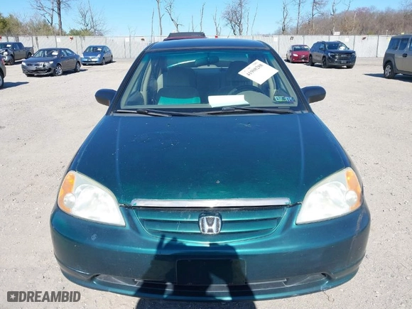 2001 Honda Civic LX with VIN 2HGES16551H567764, listed as a IAAI auction lot 41908288 with 137,740 mi miles. Bid and sale history available at carsss.com. Image 12.