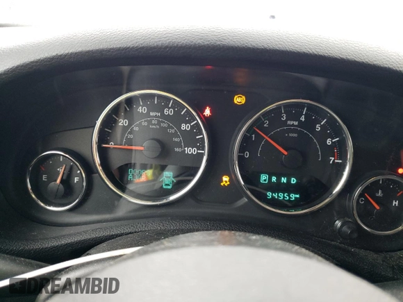 2017 Jeep Wrangler Willys Wheeler with VIN 1C4AJWAG0HL641188, listed as a Copart auction lot 52814005 with 94,959 mi miles and Salvage Title. Bid and sale history available at DreamBid. Image 9.
