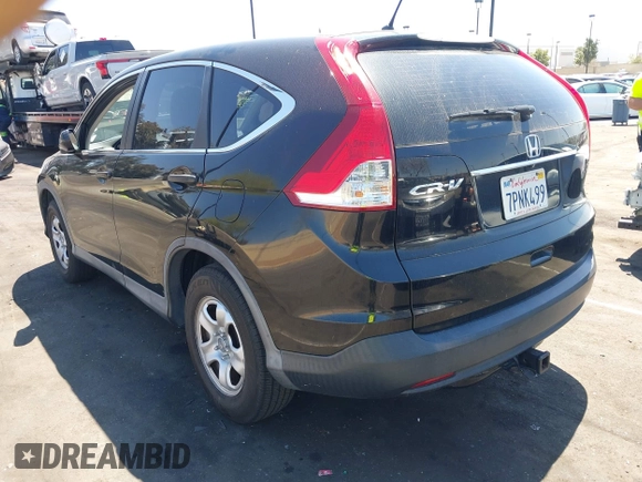 2014 Honda CR-V LX with VIN 3CZRM3H36EG704499, listed as a IAAI auction lot 41966876 with 74,054 mi miles. Bid and sale history available at carsss.com. Image 3.