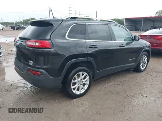 2016 Jeep Cherokee Latitude with VIN 1C4PJLCS4GW347185, listed as a IAAI auction lot 41909802 with 155,026 mi miles. Bid and sale history available at carsss.com. Image 4.