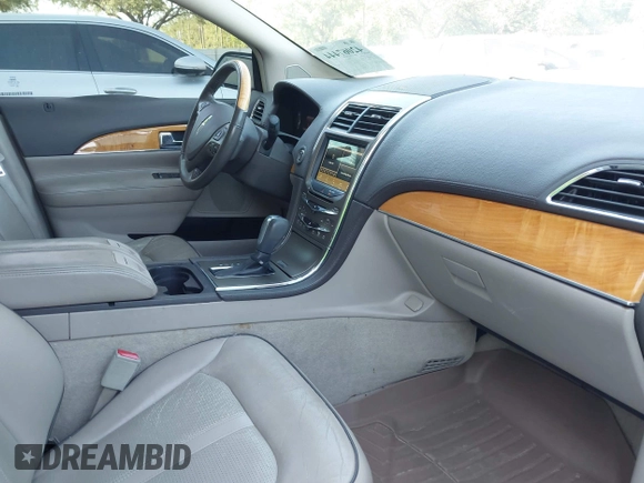 2012 Lincoln MKX with VIN 2LMDJ6JKXCBL09768, listed as a IAAI auction lot 42067444 with 174,319 mi miles. Bid and sale history available at carsss.com. Image 5.