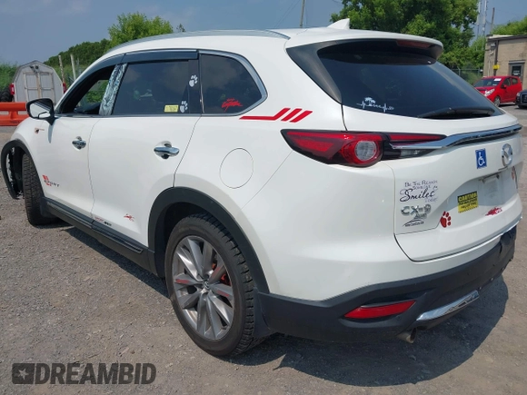 2020 Mazda CX-9 Grand Touring with VIN JM3TCBDY3L0410674, listed as a IAAI auction lot 42389157 with 130,519 mi miles and . Bid and sale history available at DreamBid. Image 3.