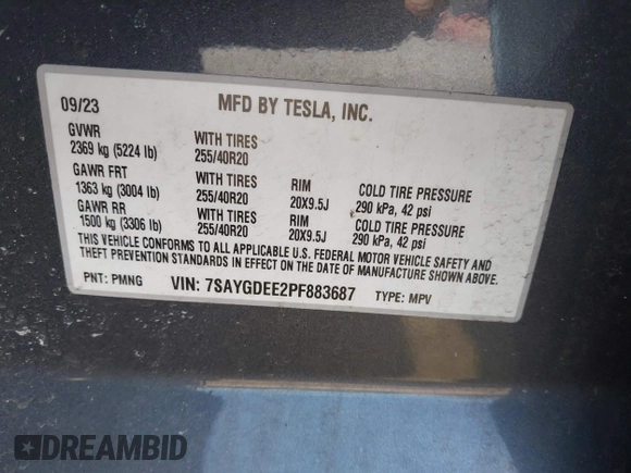 2023 Tesla Model Y Long Range with VIN 7SAYGDEE2PF883687, listed as a IAAI auction lot 41589837 with 36,890 mi miles. Bid and sale history available at carsss.com. Image 9.