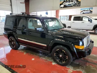 2006 Jeep Commander Limited with VIN 1J8HG58N96C300664, listed as a Copart auction lot 56022715 with 203,172 mi miles and Salvage title. Bid and sale history available at DreamBid. Image 4.
