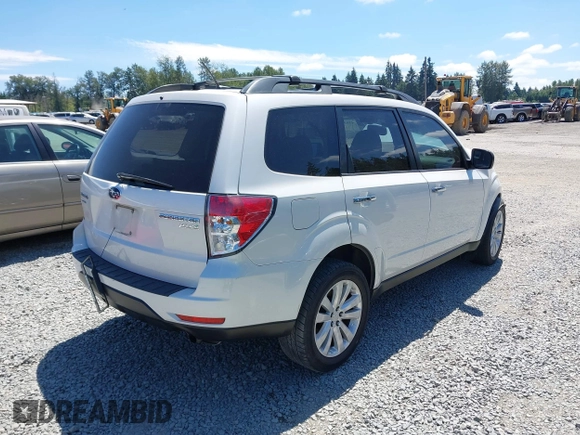 2012 Subaru Forester X Premium with VIN JF2SHADC2CH469660, listed as a IAAI auction lot 42639330 with 101,961 mi miles and . Bid and sale history available at DreamBid. Image 4.