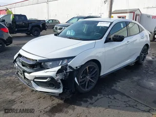 2021 Honda Civic Hatchback Sport with VIN SHHFK7H49MU411360, listed as a IAAI auction lot 41612360 with 59,216 mi miles. Bid and sale history available at carsss.com. Image 18.