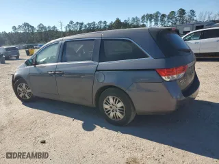2015 Honda Odyssey LX with VIN 5FNRL5H29FB117569, listed as a Copart auction lot 87870755 with 147,295 mi miles and Salvage Title. Bid and sale history available at carsss.com. Image 2.