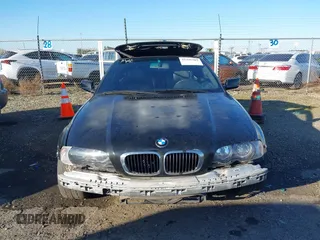 2001 BMW 3 Series 325Ci with VIN WBABS33421JY55150, listed as a IAAI auction lot 41436509 with 136,650 mi miles. Bid and sale history available at carsss.com. Image 6.