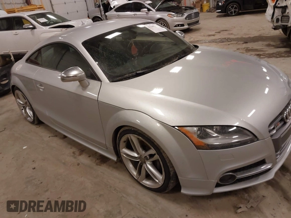2015 Audi TTS 2.0T z VIN TRUB1AFK2F1000143, wystawiony jako IAAI lot #41649250 z przebiegiem 110 321 mil mil oraz . Historia ofert i sprzedaży dostępna na DreamBid. Obrazek 1.