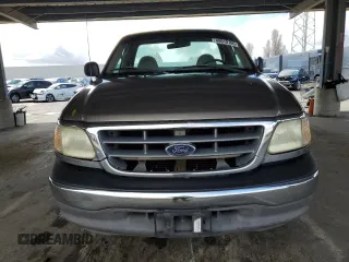 2002 Ford F-150 XL with VIN 1FTRF17W62NB40159, listed as a Copart auction lot 49010765 with 166,719 mi miles and Salvage Title. Bid and sale history available at carsss.com. Image 5.