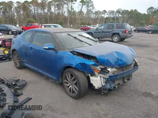2015 Scion tC with VIN JTKJF5C73F3095758, listed as a IAAI auction lot 41047982 with 187,676 mi miles. Bid and sale history available at carsss.com. Image 1.