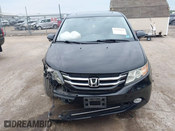 2015 Honda Odyssey Touring Elite with VIN 5FNRL5H97FB124565, listed as a IAAI auction lot 42358412 with 206,444 mi miles and . Bid and sale history available at DreamBid. Image 13.