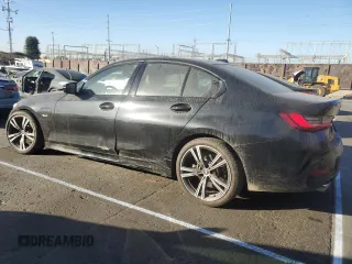 2023 BMW 3 Series 330e with VIN 3MW39FF03P8D33433, listed as a Copart auction lot 86197104 with 12,023 mi miles and Salvage Title. Bid and sale history available at carsss.com. Image 2.