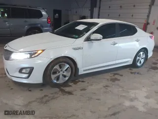 2014 Kia Optima Hybrid LX with VIN KNAGM4AD0E5075798, listed as a IAAI auction lot 41729949 with 150,552 mi miles. Bid and sale history available at carsss.com. Image 2.