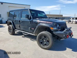 2021 Jeep Wrangler Unlimited Rubicon with VIN 1C4JJXFM9MW565029, listed as a Copart auction lot 44030695 with 76,510 mi miles and Salvage Title. Bid and sale history available at carsss.com. Image 4.