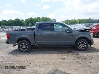 2018 Ford F-150 XL with VIN 1FTEW1EPXJFD25656, listed as a IAAI auction lot 42650683 with 119,326 mi miles and . Bid and sale history available at DreamBid. Image 13.