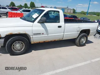 2001 Dodge 2500 z VIN 3B7KC26Z61M283195, wystawiony jako IAAI lot #42307262 z przebiegiem 127 818 mil mil oraz . Historia ofert i sprzedaży dostępna na DreamBid. Obrazek 6.