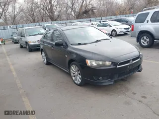 2010 Mitsubishi Lancer GTS with VIN JA32X8HWXAU004111, listed as a IAAI auction lot 41563303 with 198,931 mi miles. Bid and sale history available at carsss.com. Image 1.