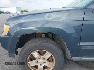 2007 Jeep Grand Cherokee Laredo with VIN 1J8GS48K17C684497, listed as a IAAI auction lot 42136314 with 155,024 mi miles. Bid and sale history available at carsss.com. Image 13.