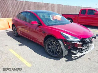 2021 Tesla Model 3 Long Range with VIN 5YJ3E1EBXMF928002, listed as a IAAI auction lot 42003092 with 25,867 mi miles. Bid and sale history available at carsss.com. Image 1.