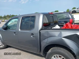 2019 Nissan Frontier SV z VIN 1N6AD0ER5KN774943, wystawiony jako IAAI lot #39604775 z przebiegiem 75 219 mil mil oraz . Historia ofert i sprzedaży dostępna na DreamBid. Obrazek 14.