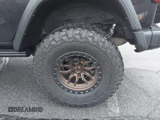 2022 Jeep Wrangler Unlimited Rubicon with VIN 1C4HJXFGXNW127064, listed as a IAAI auction lot 41491203 with 47,700 mi miles and . Bid and sale history available at DreamBid. Image 18.