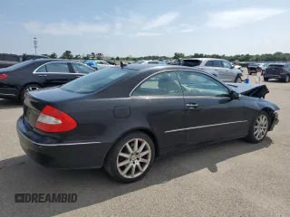 2007 Mercedes-Benz CLK 350 with VIN WDBTJ56H77F230404, listed as a Copart auction lot 65291925 with 128,021 mi miles and Salvage title. Bid and sale history available at DreamBid. Image 3.