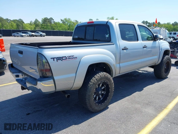 2013 Toyota Tacoma PreRunner z VIN 5TFJU4GN6DX032952, wystawiony jako IAAI lot #42001014 z przebiegiem 152 755 mil mil oraz . Historia ofert i sprzedaży dostępna na DreamBid. Obrazek 4.