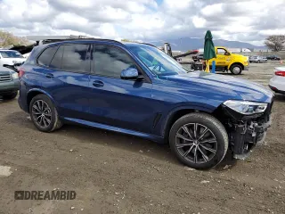 2021 BMW X5 xDrive45e with VIN 5UXTA6C09M9H50122, listed as a Copart auction lot 48162735 with 59,697 mi miles and Salvage Title. Bid and sale history available at carsss.com. Image 4.
