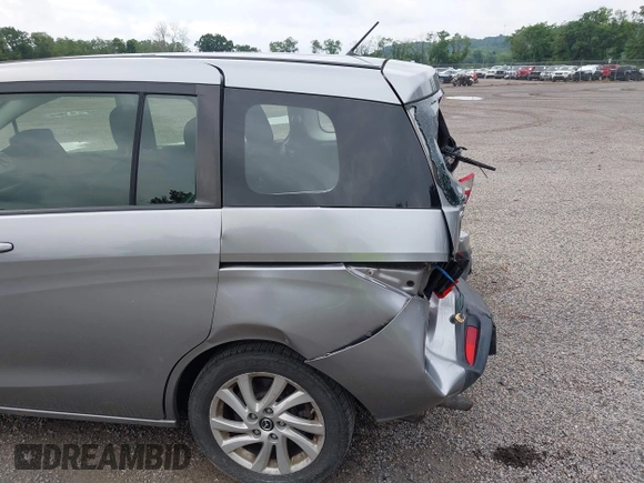 2014 Mazda 5 Sport z VIN JM1CW2BL5E0172594, wystawiony jako IAAI lot #42628707 z przebiegiem 180 369 mil mil oraz . Historia ofert i sprzedaży dostępna na DreamBid. Obrazek 20.