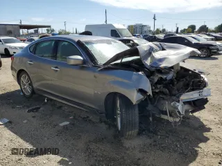 2012 Infiniti M Hybrid with VIN JN1EY1APXCM910481, listed as a Copart auction lot 52943285 with Not Provided miles and Salvage Title. Bid and sale history available at DreamBid. Image 4.