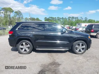 2014 Jeep Grand Cherokee Overland with VIN 1C4RJECG8EC417995, listed as a IAAI auction lot 41959550 with 155,029 mi miles. Bid and sale history available at carsss.com. Image 13.