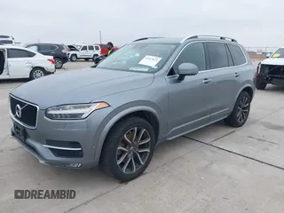 2016 Volvo XC90 T6 Momentum with VIN YV4A22PKXG1021392, listed as a IAAI auction lot 41413673 with 144,761 mi miles. Bid and sale history available at carsss.com. Image 2.