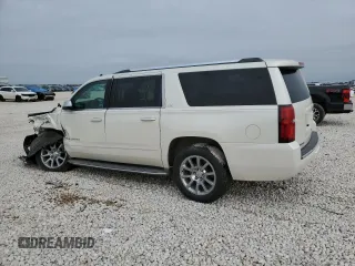 2015 Chevrolet Suburban LTZ with VIN 1GNSCKKC2FR177759, listed as a Copart auction lot 50919105 with 87,793 mi miles and Salvage Title. Bid and sale history available at DreamBid. Image 2.