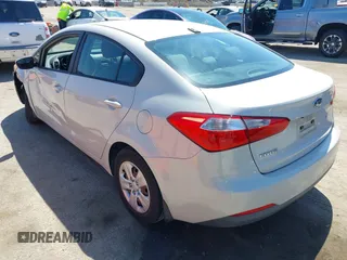 2014 Kia Forte LX with VIN KNAFK4A63E5115830, listed as a IAAI auction lot 42087188 with 111,660 mi miles. Bid and sale history available at carsss.com. Image 3.