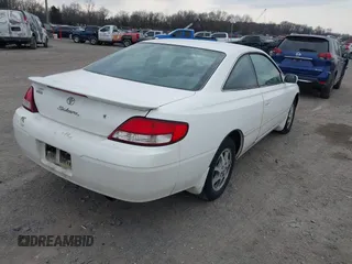 2000 Toyota Solara SE with VIN 2T1CG22P0YC393112, listed as a IAAI auction lot 41677631 with 253,406 mi miles. Bid and sale history available at carsss.com. Image 4.