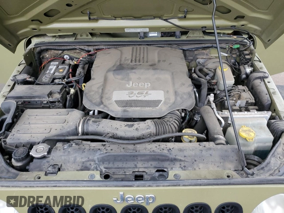 2013 Jeep Wrangler Sport with VIN 1C4AJWAGXDL586971, listed as a Copart auction lot 61574535 with 178,927 mi miles and Clean title. Bid and sale history available at DreamBid. Image 11.