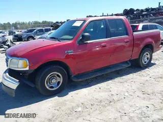 2001 Ford F-150 SuperCrew XLT with VIN 1FTRW07L11KE20412, listed as a IAAI auction lot 41877980 with 1 mi miles. Bid and sale history available at carsss.com. Image 16.