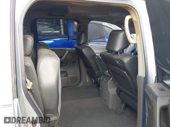 2005 Nissan Titan XE with VIN 1N6AA07A95N511746, listed as a IAAI auction lot 42190947 with 216,306 mi miles and . Bid and sale history available at DreamBid. Image 8.