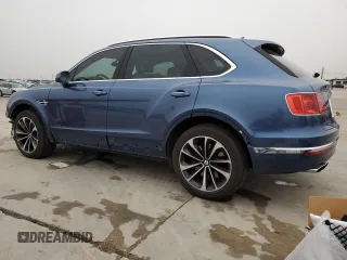 2019 Bentley Bentayga V8 z VIN SJAAM2ZV5KC024865, wystawiony jako Copart lot #42869533 z przebiegiem 23 687 mil mil oraz . Historia ofert i sprzedaży dostępna na DreamBid. Obrazek 2.