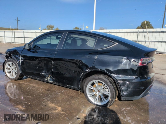 2023 Tesla Model Y Long Range with VIN 7SAYGDEE5PF850358, listed as a Copart auction lot 52581615 with 19,376 mi miles and Salvage Title. Bid and sale history available at DreamBid. Image 2.