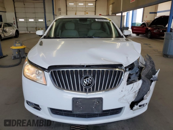 2013 Buick LaCrosse Leather с VIN 1G4GC5E39DF120383, выставлен на аукционе Copart как лот 60920775 с пробегом 124 044 миль миль и Списание • Salvage title. История ставок и продаж доступна на DreamBid. Изображение 5.