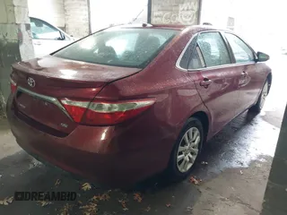2015 Toyota Camry XLE with VIN 4T1BF1FK8FU932854, listed as a IAAI auction lot 41872099 with Not Provided miles and . Bid and sale history available at DreamBid. Image 4.