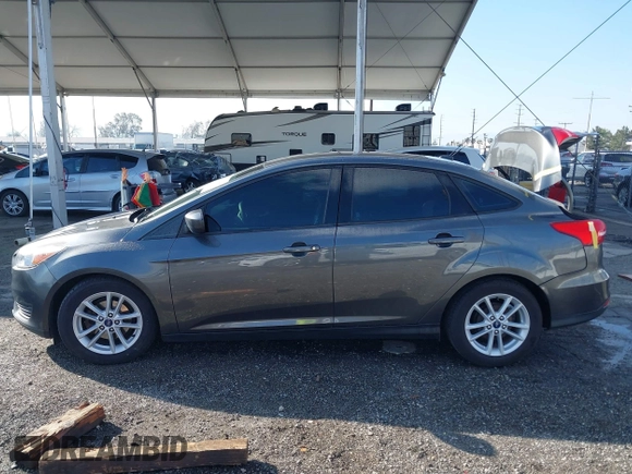 2018 Ford Focus SE with VIN 1FADP3F27JL285891, listed as a IAAI auction lot 41750264 with 103,815 mi miles. Bid and sale history available at carsss.com. Image 14.