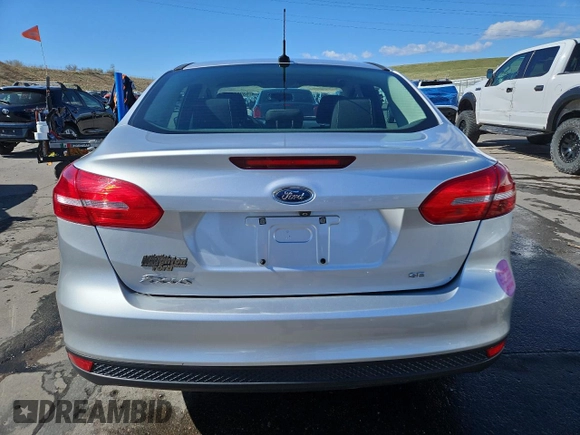 2017 Ford Focus SE with VIN 1FADP3F2XHL277097, listed as a Copart auction lot 53209825 with 100,384 mi miles and Salvage Title. Bid and sale history available at carsss.com. Image 6.