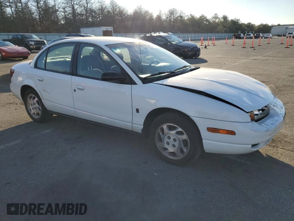 2001 Saturn SL z VIN 1G8ZK52771Z219294, wystawiony jako Copart lot #83155494 z przebiegiem 190 338 mil mil oraz Szkody całkowita. Historia ofert i sprzedaży dostępna na DreamBid. Obrazek 4.