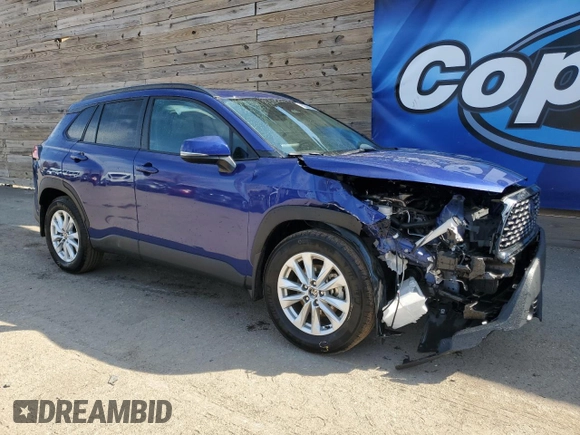 2024 Toyota Corolla Cross LE with VIN 7MUBAABG5RV088288, listed as a Copart auction lot 52493325 with 59,788 mi miles and Clean title. Bid and sale history available at DreamBid. Image 4.