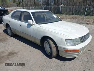 1996 Lexus LS 400 z VIN JT8BH22F8T0054793, wystawiony jako IAAI lot #41879191 z przebiegiem 121 478 mil mil oraz . Historia ofert i sprzedaży dostępna na DreamBid. Obrazek 1.