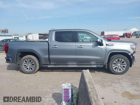 2021 GMC Sierra 1500 Denali z VIN 3GTU9FETXMG382438, wystawiony jako IAAI lot #41880365 z przebiegiem 54 651 mil mil oraz . Historia ofert i sprzedaży dostępna na DreamBid. Obrazek 14.